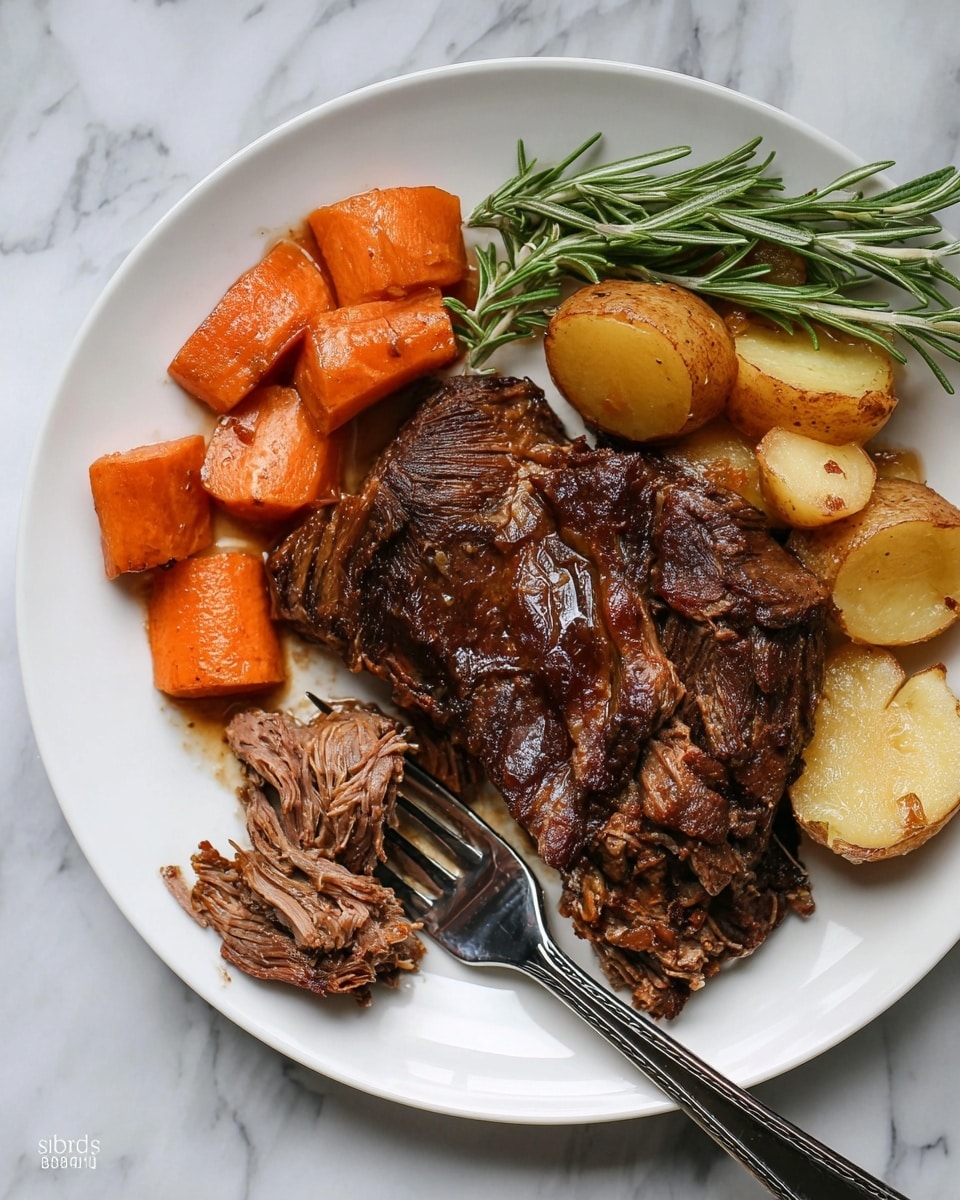 The image shows a white plate on a white marbled surface filled with a rich, brown cooked meat with a slightly charred, textured top layer, and some pulled apart pieces showing the tender, fibrous inside, pushed by a fork with a dark handle. To the left, there are several thick chunks of bright orange cooked carrots. Behind the meat, there are some fresh, green rosemary sprigs adding a vibrant contrast in color. The whole dish looks warm, juicy, and well-cooked, with the meat layers showcasing a mix of crispy outer bits and softer inner layers. photo taken with an iphone --ar 4:5 --v 7