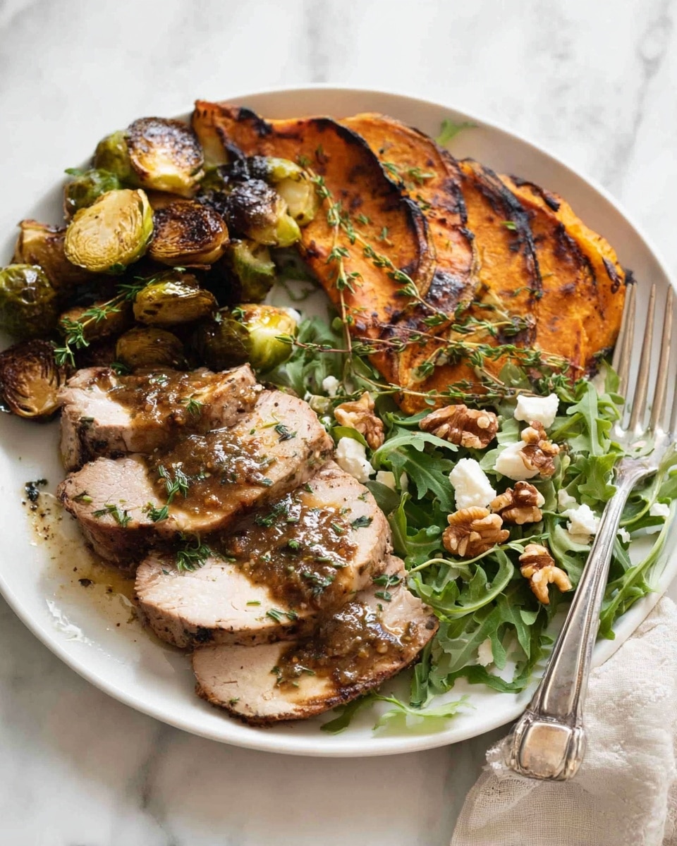 A white plate on a white marbled surface holds three slices of cooked chicken with golden brown edges and herbs on top, placed in the center left. On the upper left of the plate, there is a small pile of roasted brussels sprouts, browned and slightly crispy. On the right side, a few pieces of roasted sweet potato with darker caramelized edges sit on a small bed of fresh green spinach leaves, sprinkled with white feta cheese and small walnut pieces. A silver fork rests on the left side of the plate, pointing inward. The food appears juicy with a light drizzle of sauce around it. Photo taken with an iphone --ar 4:5 --v 7