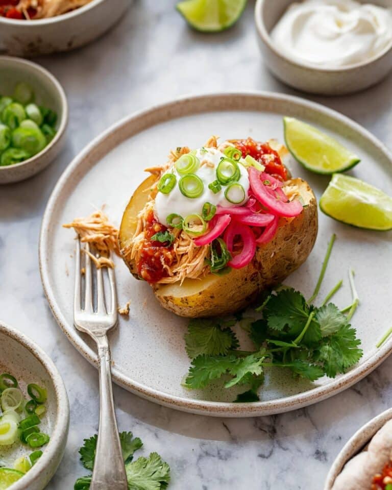3-Ingredient Crockpot Salsa Chicken Stuffed Potatoes Recipe