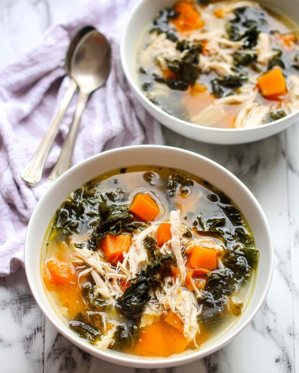 Two white bowls filled with a clear broth soup are shown on a white marbled surface. Each bowl contains three main layers: large orange cubed pieces, dark green leafy vegetables, and light shredded white pieces of meat, all floating in the broth. The orange pieces are evenly spread around the bowl, while the dark leafy greens are scattered in between. The shredded meat clusters in the center, adding texture contrast. Two old-fashioned silver spoons lay beside the bowls. A light purple striped cloth is softly folded in the background. Photo taken with an iphone --ar 4:5 --v 7