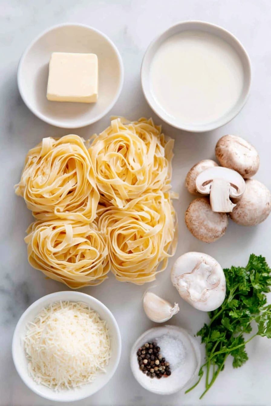 Flat lay of a small mound of uncooked fettuccine pasta nests neatly arranged, a handful of fresh whole cremini mushrooms sliced to show texture, a few cloves of whole garlic bulbs with some peeled garlic cloves beside them, a square slab of unsalted butter partially sliced, a small white ceramic bowl filled with heavy cream, another small white bowl holding grated Parmesan cheese, a small white bowl of dry white wine with a slight golden tint, a small white bowl of coarse salt crystals, a small white bowl of cracked black peppercorns, and a few sprigs of fresh green parsley loosely placed, all ingredients fresh and natural, perfectly spaced in balanced symmetry on a simple white ceramic surface, placed on a clean white marble surface, soft natural light, photo taken with an iPhone, professional food photography style, fresh ingredients, white ceramic bowls, no bottles, no duplicates, no utensils, no packaging --ar 2:3 --v 7 --p awthu7i m7354615311229779997 - Creamy Mushroom Pasta, Creamy Mushroom Pasta Recipe, Easy Mushroom Pasta, Garlic Mushroom Pasta, Vegetarian Mushroom Pasta
