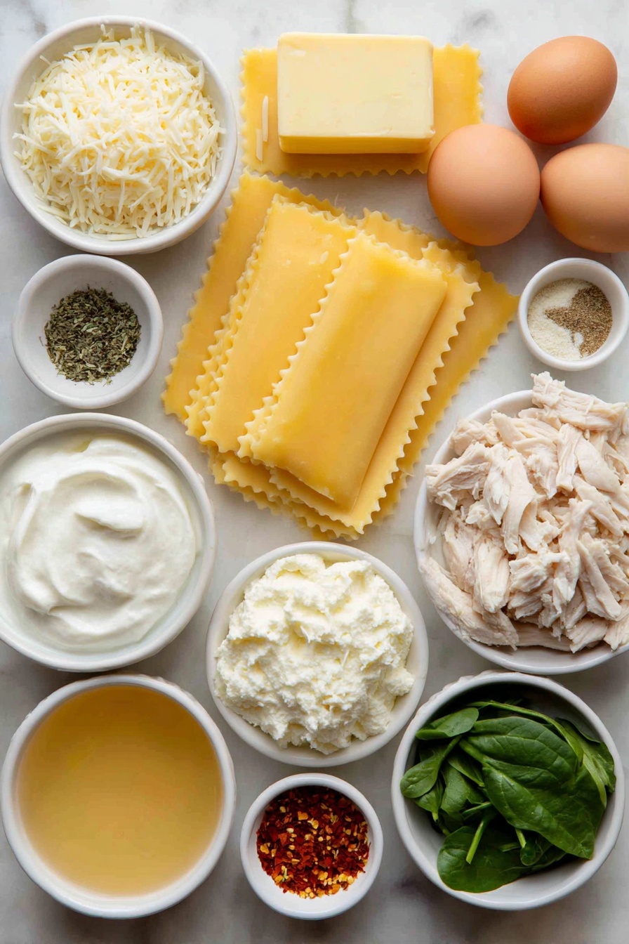 Flat lay of classic lasagna noodles arranged lengthwise, shredded mozzarella cheese loosely piled, unsalted butter block, garlic cloves whole and unpeeled, all-purpose flour in a small white ceramic bowl, chicken broth in a small white ceramic bowl, half and half in a small white ceramic bowl, dried parsley, dried basil, dried oregano, onion powder, dried thyme, pepper, chicken bouillon powder, red pepper flakes each in small white ceramic bowls as fine powders, freshly grated Parmesan cheese heaped, shredded rotisserie chicken chunks, two whole uncracked brown eggs, whole milk ricotta cheese in a small white ceramic bowl, full fat sour cream in a small white ceramic bowl, chopped fresh basil sprigs, nutmeg powder in a small white ceramic bowl, chopped artichoke hearts, thawed chopped spinach arranged neatly — all ingredients spaced symmetrically on a clean white marble surface, soft natural light, photo taken with an iPhone, professional food photography style, fresh ingredients, white ceramic bowls, no bottles, no duplicates, no utensils, no packaging --ar 2:3 --v 7 --p m7354615311229779997 - Creamy White Chicken Lasagna, white chicken lasagna, chicken lasagna with Alfredo sauce, cheesy chicken lasagna, comforting chicken pasta bake