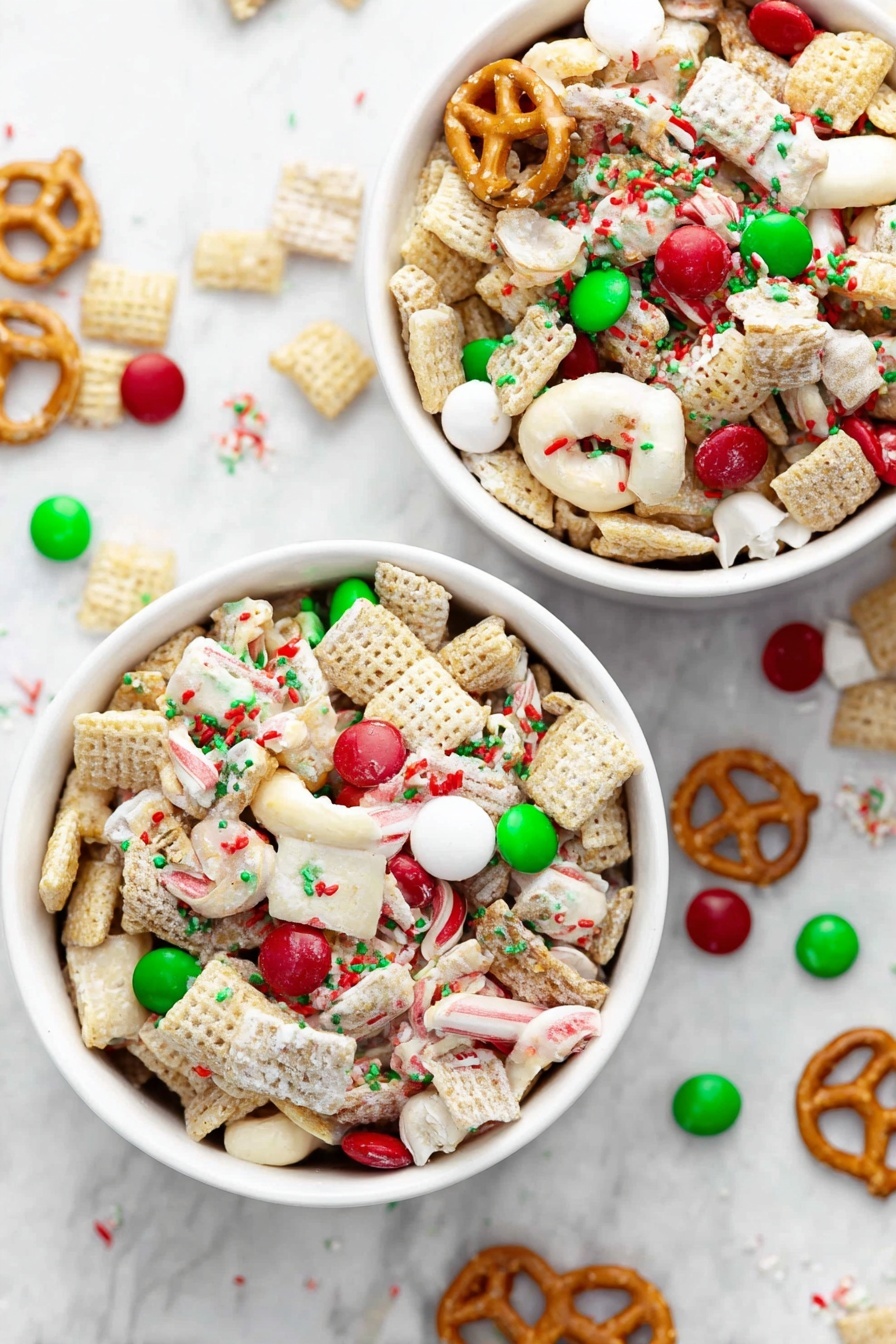 The image shows two white bowls filled with a festive snack mix on a white marbled surface. Each bowl holds a colorful mix of light beige square cereal pieces, white chocolate-covered pretzels, red and green candy-coated chocolates, and small round red, white, and green sprinkles scattered evenly over the mix. The colors are bright and create a holiday feel. Some pieces of the mix are scattered on the surface around the bowls. Photo taken with an iphone --ar 2:3 --v 7 - Festive Gluten-Free Christmas Chex Mix, holiday gluten-free snack, no-bake Christmas snack, gluten-free holiday treats, easy Christmas party snack