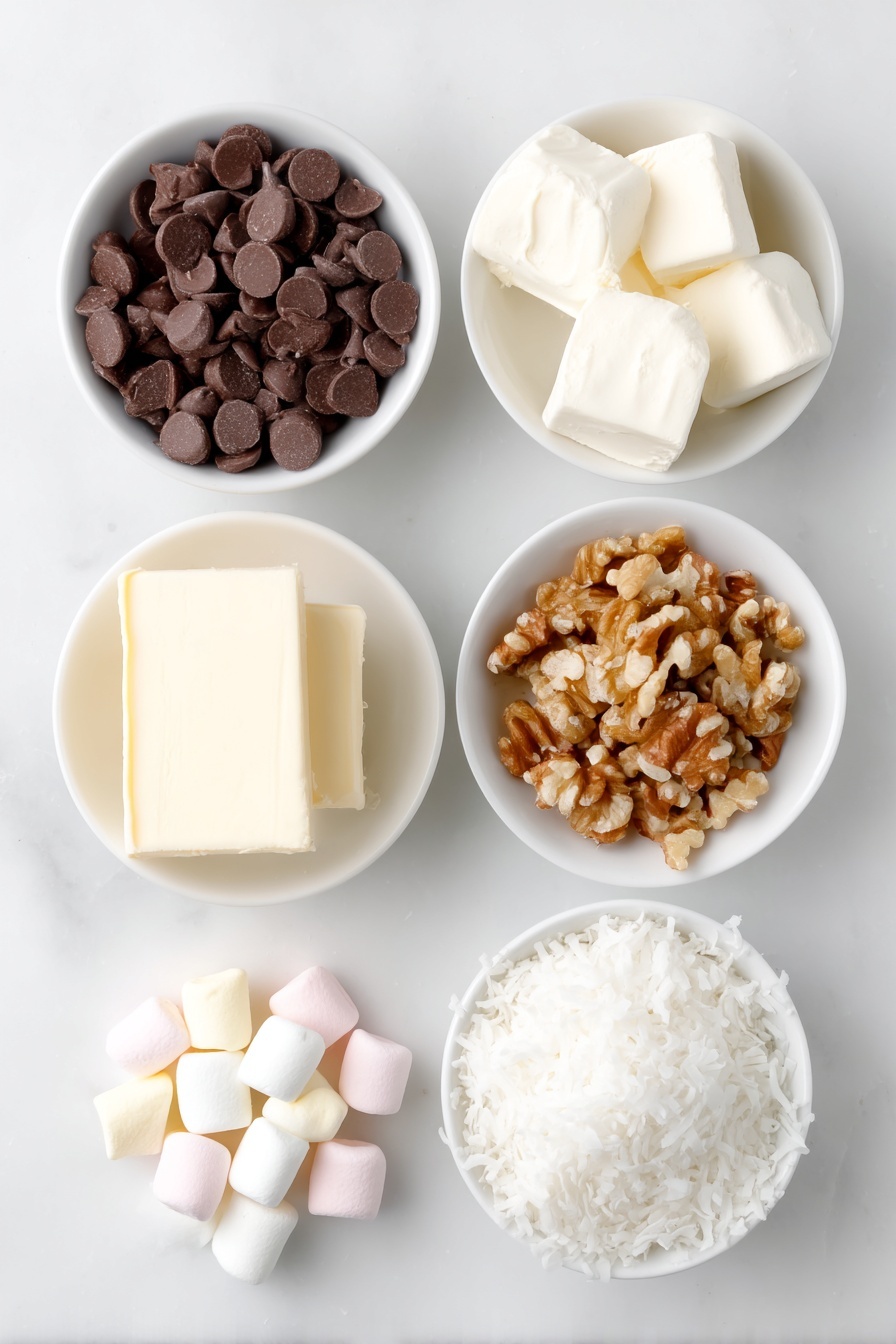Flat lay of a small pile of glossy semisweet chocolate chips, several cubes of pale yellow butter, a scattered handful of pastel miniature marshmallows in soft pink, white, and yellow hues, a small mound of toasted chopped walnuts with a golden-brown tone, and a neat pile of white flaked coconut, all arranged separately in simple white ceramic bowls or directly on the surface, placed on a clean white marble surface, soft natural light, photo taken with an iPhone, professional food photography style, fresh ingredients, white ceramic bowls, no bottles, no duplicates, no utensils, no packaging --ar 2:3 --v 7 --p m7354615311229779997 - Church Window Cookies, no-bake cookies, colorful cookie recipe, marshmallow coconut cookies, easy holiday treats