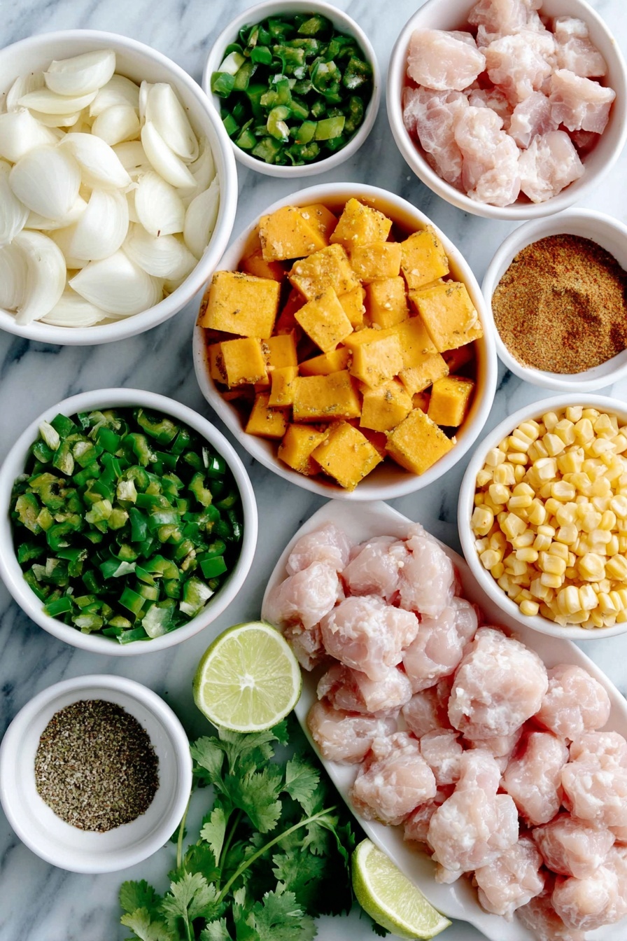Flat lay of a few cloves of fresh garlic, one large white onion chopped, one green bell pepper diced very small, a small bunch of fresh cilantro sprigs, a small white ceramic bowl filled with diced mild green chiles, multiple bright orange cubes of butternut squash, a small white bowl containing ground cumin powder, a small white bowl with dried oregano, raw boneless skinless chicken thighs arranged neatly, a small white ceramic bowl with fresh yellow corn kernels, one small whole lime cut in half showing juicy interior, a small white bowl filled with coarse salt, and a small white bowl with freshly ground black pepper placed on a clean white marble surface, soft natural light, photo taken with an iPhone, professional food photography style, fresh ingredients, white ceramic bowls, no bottles, no duplicates, no utensils, no packaging --ar 2:3 --v 7 --p m7354615311229779997 - Butternut Squash Green Chile Chicken Soup, healthy green chile soup, cozy butternut squash soup, easy chicken and vegetable soup, spicy fall squash soup