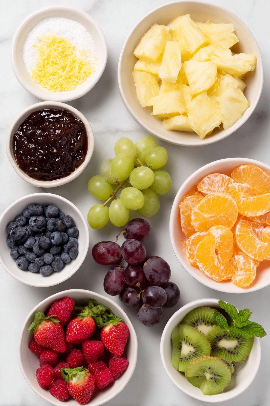 Flat lay of a small white ceramic bowl of glossy apricot preserves, a small white ceramic bowl of granulated sugar, a small white ceramic bowl with bright yellow lemon zest, a small white ceramic bowl of fresh lemon juice, a pile of freshly chopped golden pineapple chunks, a group of halved deep purple grapes, a group of halved vibrant green grapes, quartered ripe red strawberries with green tops removed, peeled and quartered bright green kiwi pieces, chunks of ripe orange mango flesh, a mound of plump blue blueberries, a handful of bright red raspberries, neatly drained mandarin orange segments arranged in a small white ceramic bowl, and a few sprigs of fresh green mint leaves, placed on a clean white marble surface, soft natural light, photo taken with an iPhone, professional food photography style, fresh ingredients, white ceramic bowls, no bottles, no duplicates, no utensils, no packaging --ar 2:3 --v 7 --p m7354615311229779997 - Best Fresh Fruit Salad, fresh fruit salad ideas, easy fruit salad, healthy fruit salad, summer fruit salad